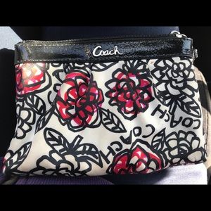 Coach poppy graffiti wristlet.